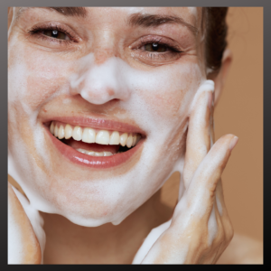 Woman giving her dull skin a refresh with these professional skincare tips